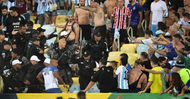 Fans of Argentina clash with Brazilian police before the start of the 2026 FIFA World Cup South American qualification football match between Brazil and Argentina at Maracana Stadium, Rio de Janeiro, Brazil, Nov. 21, 2023. (AFP Photo)
