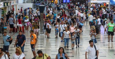 Passengers are seen at a terminal of busy Antalya Airport, Antalya, southern Türkiye, Nov. 14, 2023. (DHA Photo)
