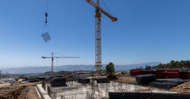 A housing estate is being built by the state-run Housing Development Administration of Türkiye (TOKI) some 15 kilometers (9.32 miles) from the center of Antakya, Hatay, southern Türkiye, July 31, 2023. (Reuters Photo)