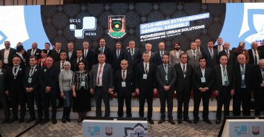 Participants of the United Cities and Local Governments Middle East and West Asia Section (UCLG-MEWA) Extraordinary General Assembly pose for a group photo in Şanlıurfa, Türkiye, Nov. 22, 2023. (IHA Photo)