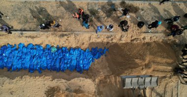 The Israeli army delivered the bodies of 111 Palestinians it killed in the northern regions of the Gaza Strip and Gaza City to the Palestinian side last night who were buried in a mass grave in Khan Younis, southern Gaza Strip, Palestine, Nov. 22, 2023. (AA Photo)