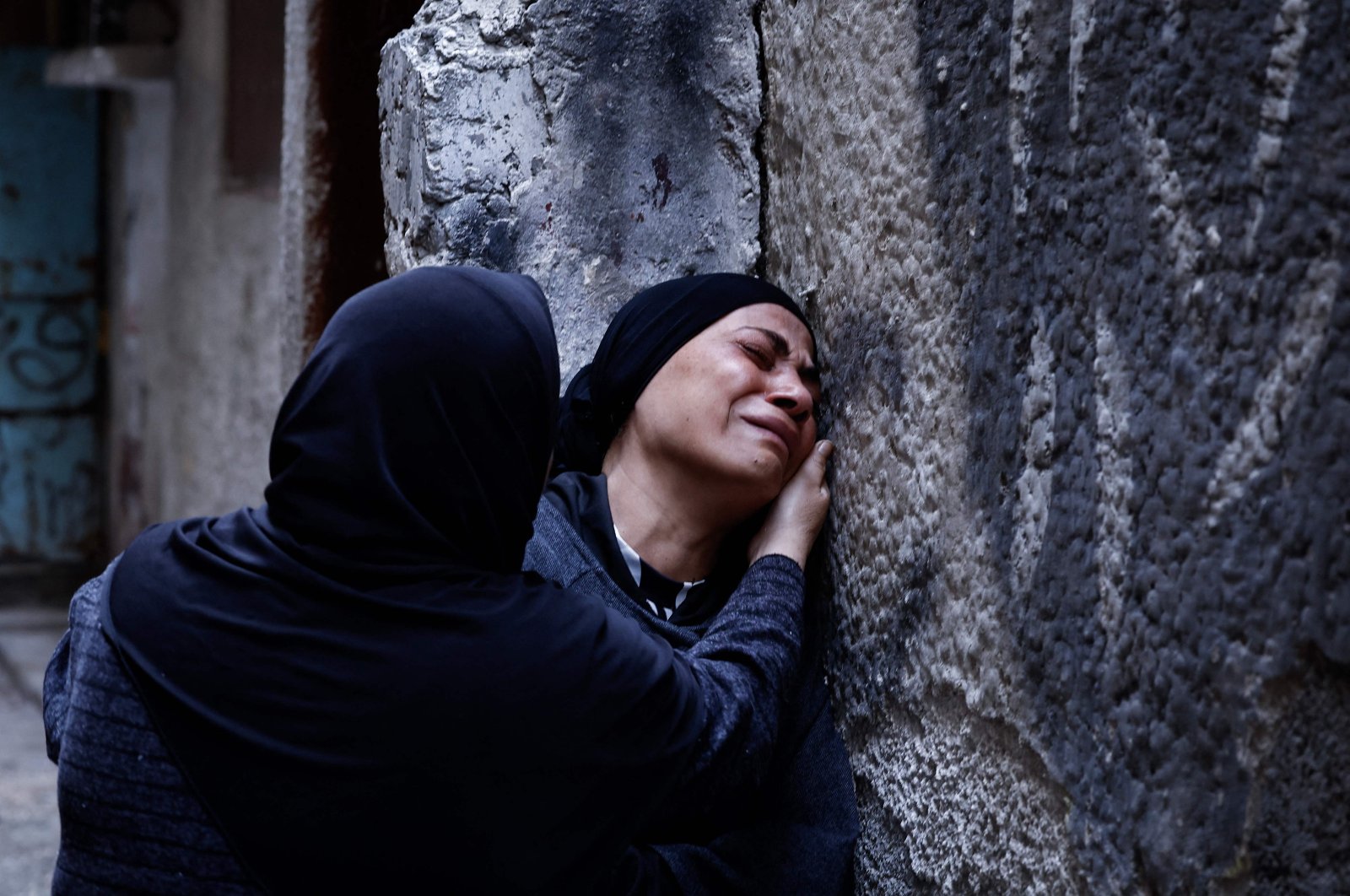 Relatives cry during the funeral of a Palestinian man killed in an Israeli raid in the Balata refugee camp, Nablus, occupied West Bank, Palestine, Nov. 22, 2023. (AFP Photo)