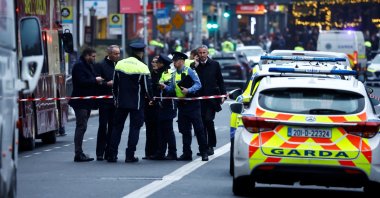 Police officers work at the scene of a suspected stabbing that left few children injured in Dublin, Ireland, Nov. 23, 2023. (Reuters Photo)