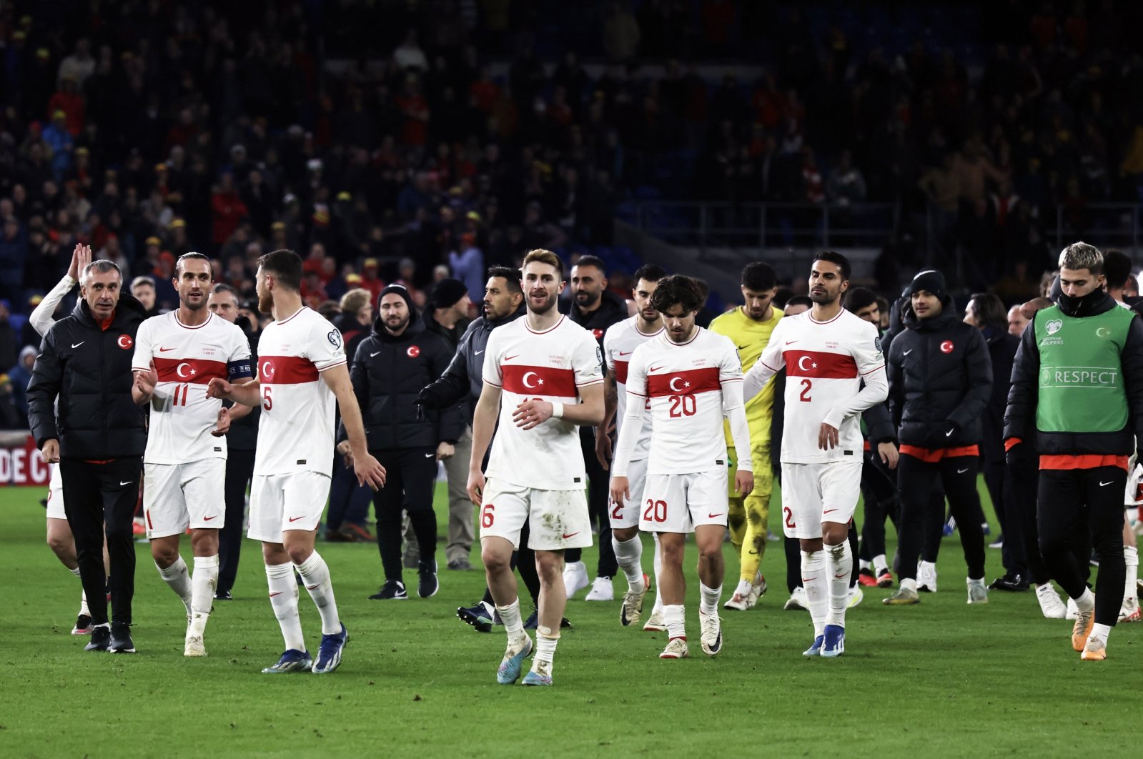 Turkish national football team players applaud fans after the draw against Wales, Cardiff, Wales, Nov. 21, 2023. (AA Photo)