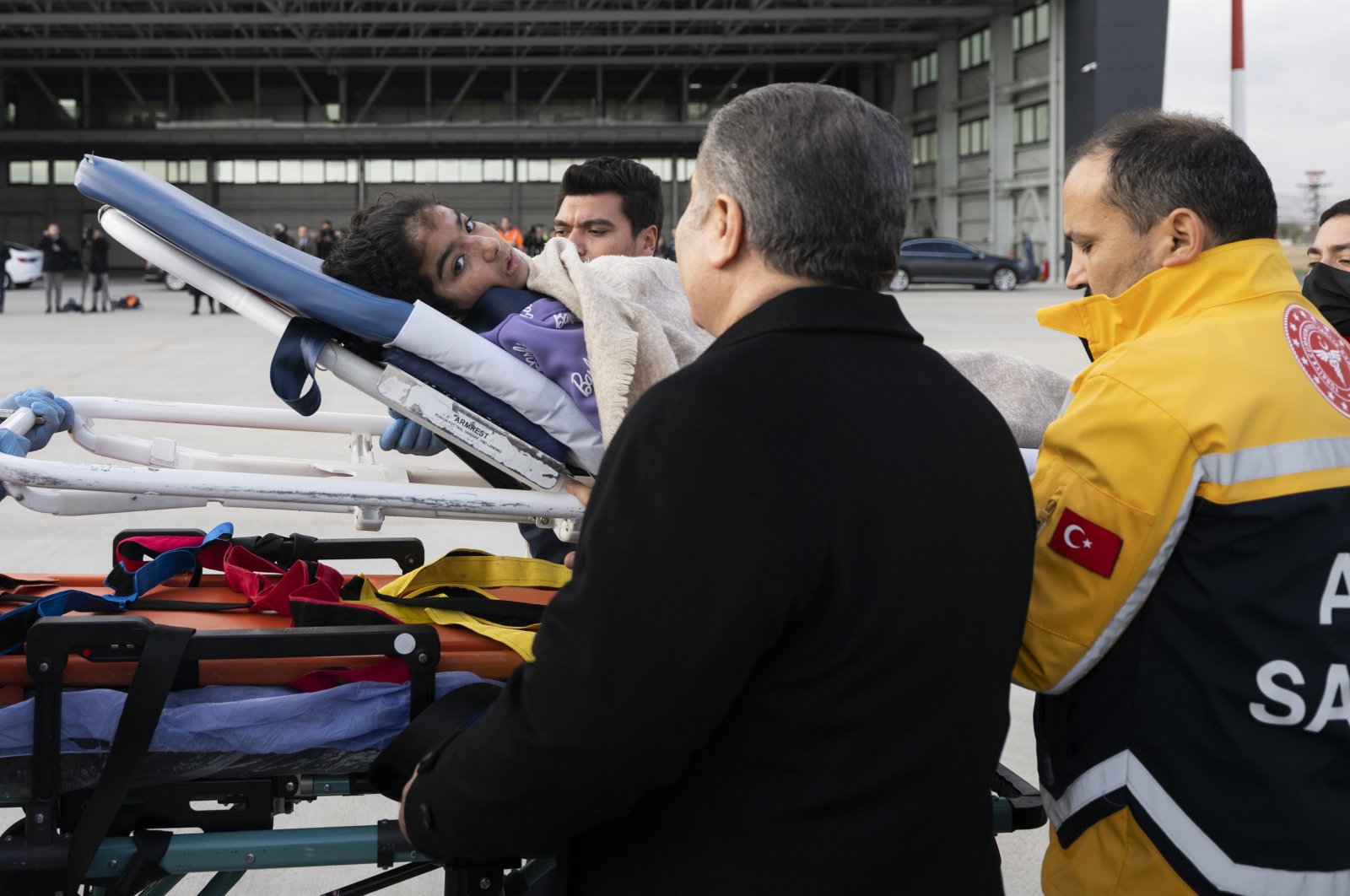 Minister Fahrettin Koca welcomes an injured Palestinian girl, in the capital Ankara, Türkiye, Nov. 23, 2023. (AA Photo)