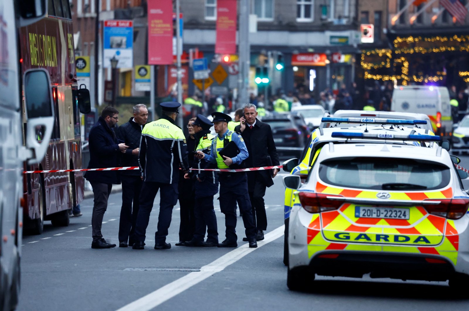 Police officers work at the scene of a suspected stabbing that left few children injured in Dublin, Ireland, Nov. 23, 2023. (Reuters Photo)