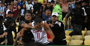 Fans of Argentina clash with Brazilian police before the start of the 2026 FIFA World Cup South American qualification football match between Brazil and Argentina at Maracana Stadium, Rio de Janeiro, Brazil, Nov. 21, 2023. (AFP Photo)