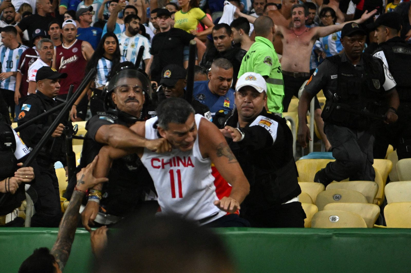 Fans of Argentina clash with Brazilian police before the start of the 2026 FIFA World Cup South American qualification football match between Brazil and Argentina at Maracana Stadium, Rio de Janeiro, Brazil, Nov. 21, 2023. (AFP Photo)