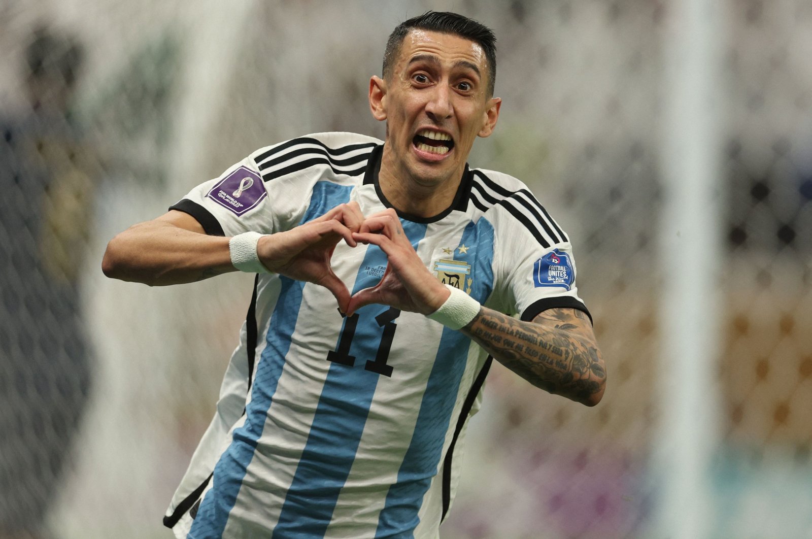 Argentina&#039;s midfielder Angel Di Maria celebrates scoring his team&#039;s second goal during the Qatar 2022 World Cup final football match between Argentina and France at Lusail Stadium, Lusail, Qatar, Dec. 18, 2022. (AFP Photo)