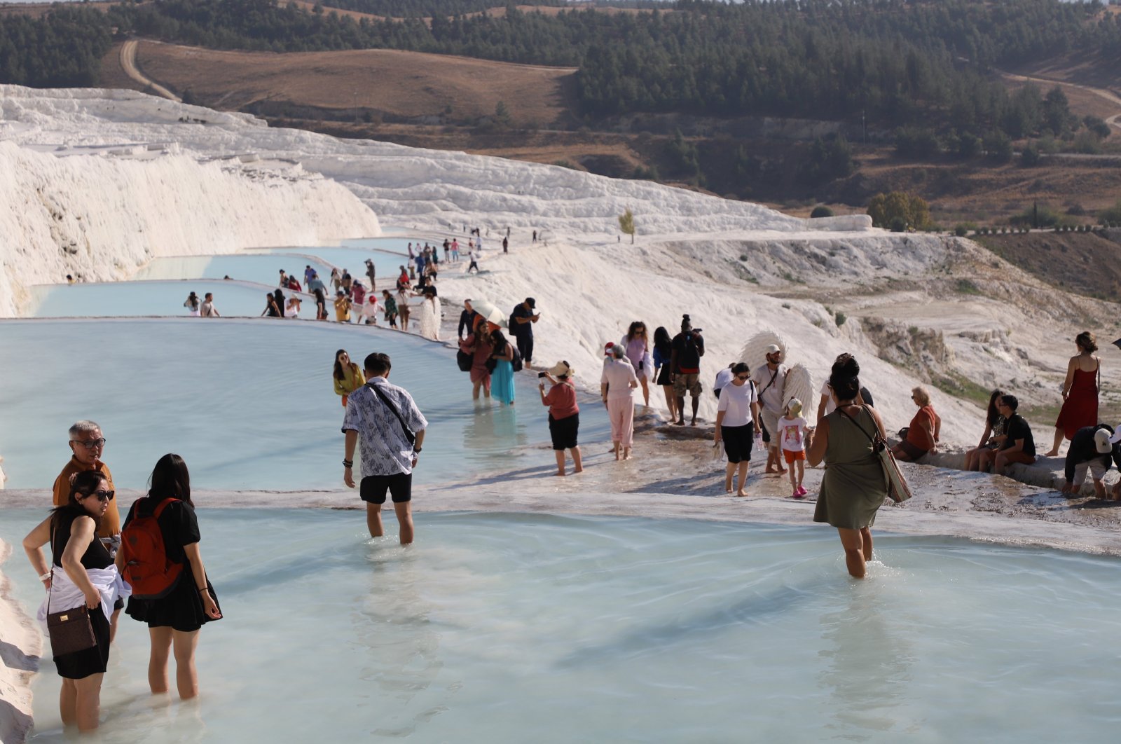 Tourists are seen in Pamukkale, Denizli province, western Türkiye, Nov. 8, 2023. (AA Photo) 