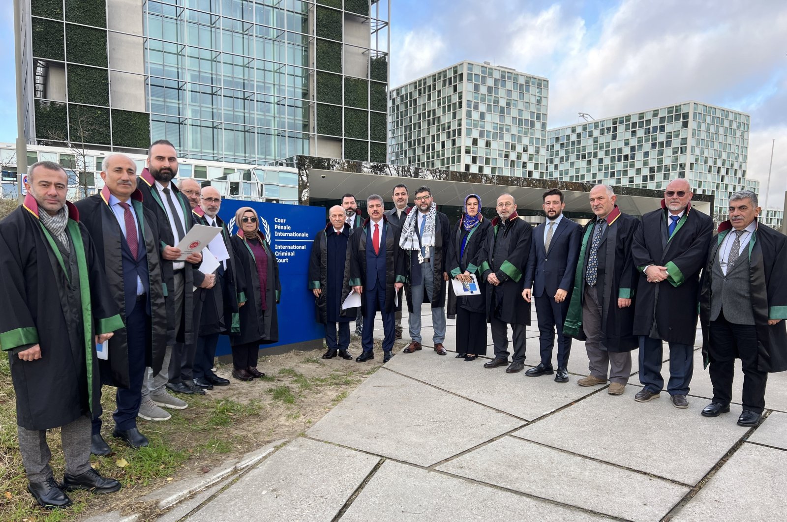 Turkish jurists pose outside The International Criminal Court (ICC) building in The Hague, the Netherlands, Nov. 23, 2023. (AA Photo)