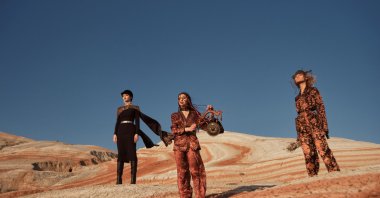 Models pose on the Khizi Mountains, Baku, Azerbaijan, June 2, 2022. (Getty Images Photo)