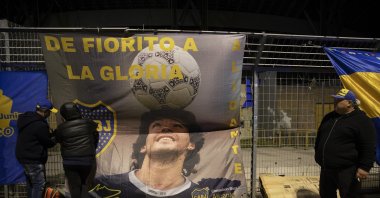 Boca Juniors fans pay respect to the late Diego Maradona's picture, Argentina, Nov. 25, 2023. (AA Photo)
