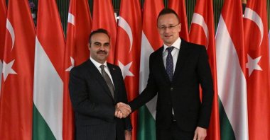 Industry and Technology Minister Mehmet Fatih Kacır shakes hands with Peter Szijjarto, minister of Foreign Affairs and Trade of Hungary, Budapest, Hungary, Nov. 24, 2023. (IHA Photo)
