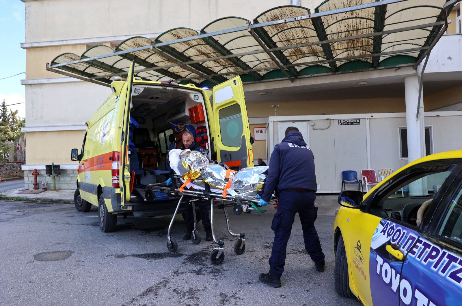 A crew member of a cargo ship is transferred to a hospital following a rescue operation, after a vessel sank off the Greek island of Lesbos, Greece, Nov. 26, 2023. (Reuters Photo)