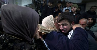 Palestinian prisoner Khalil Zama&#039; (R) hugs a relative after being released from an Israeli jail, Hebron, occupied West Bank, Nov. 27, 2023.