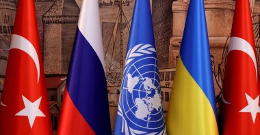 Flags of Türkiye, Russia, the United Nations and Ukraine are seen on the day of a signing ceremony in Istanbul, Türkiye, July 22, 2022. (Reuters Photo)