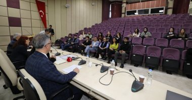 Professor Erol Esen, head of Akdeniz University Social Policy and Migration Studies Application and Research Center (ASPAG), presents the details of the upcoming ANISF forum to be held in Antalya, southern Türkiye, Nov. 27, 2023. (IHA Photo)