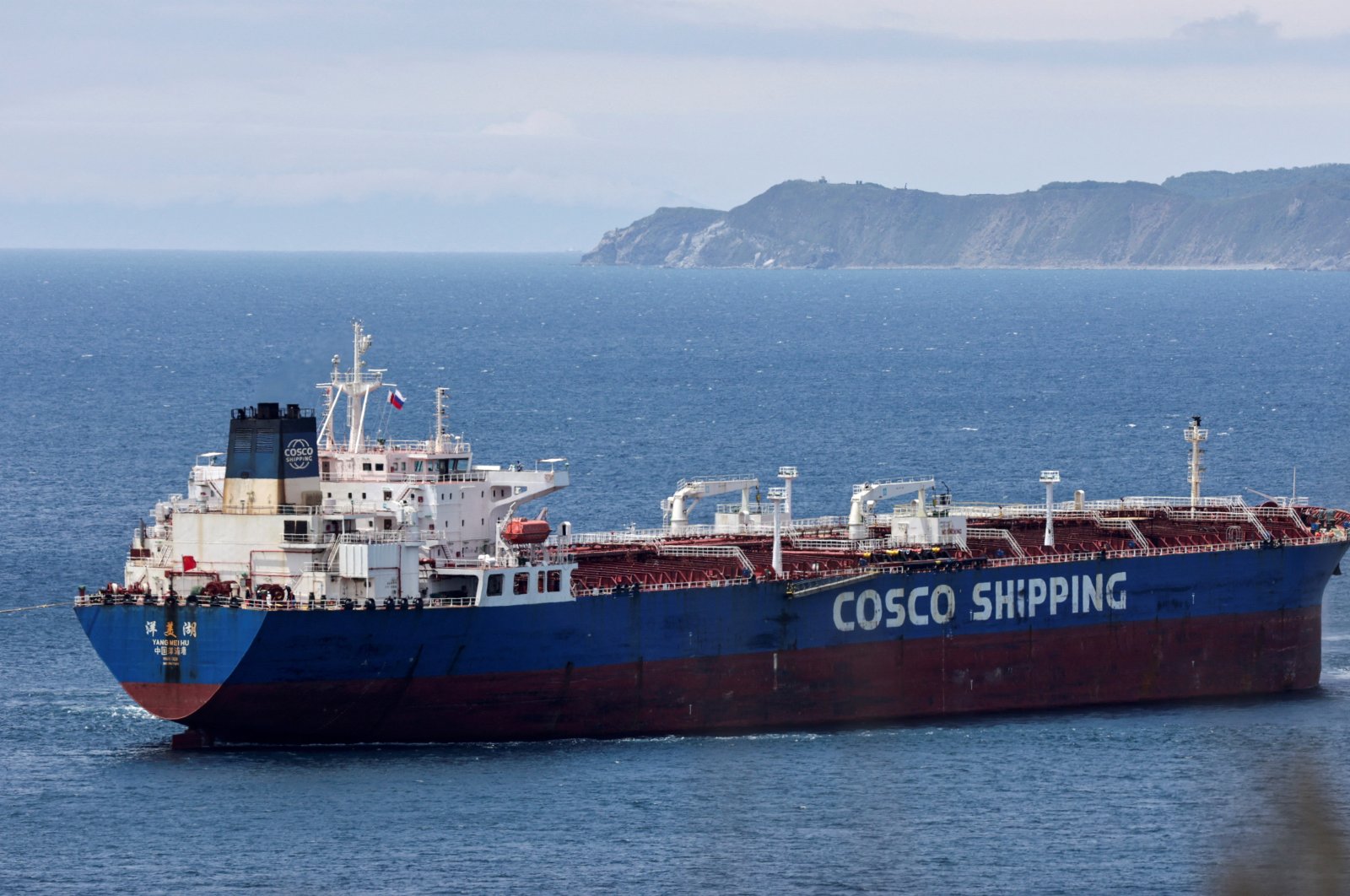 Yang Mei Hu oil products tanker owned by COSCO Shipping moors at the crude oil terminal Kozmino on the shore of Nakhodka Bay near the port city of Nakhodka, Russia, June 13, 2022. (Reuters Photo)