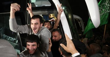 Palestinian prisoners freed from the Ofer Israeli military prison react as they get greeted by crowds awaiting their return in Beitonia, near Ramallah, West Bank, Nov. 28, 2023. (EPA Photo)