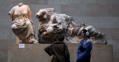 Visitors look at the Elgin marbles also known as the Parthenon marbles, at the British Museum in London, U.K., Nov. 28, 2023. (EPA Photo)