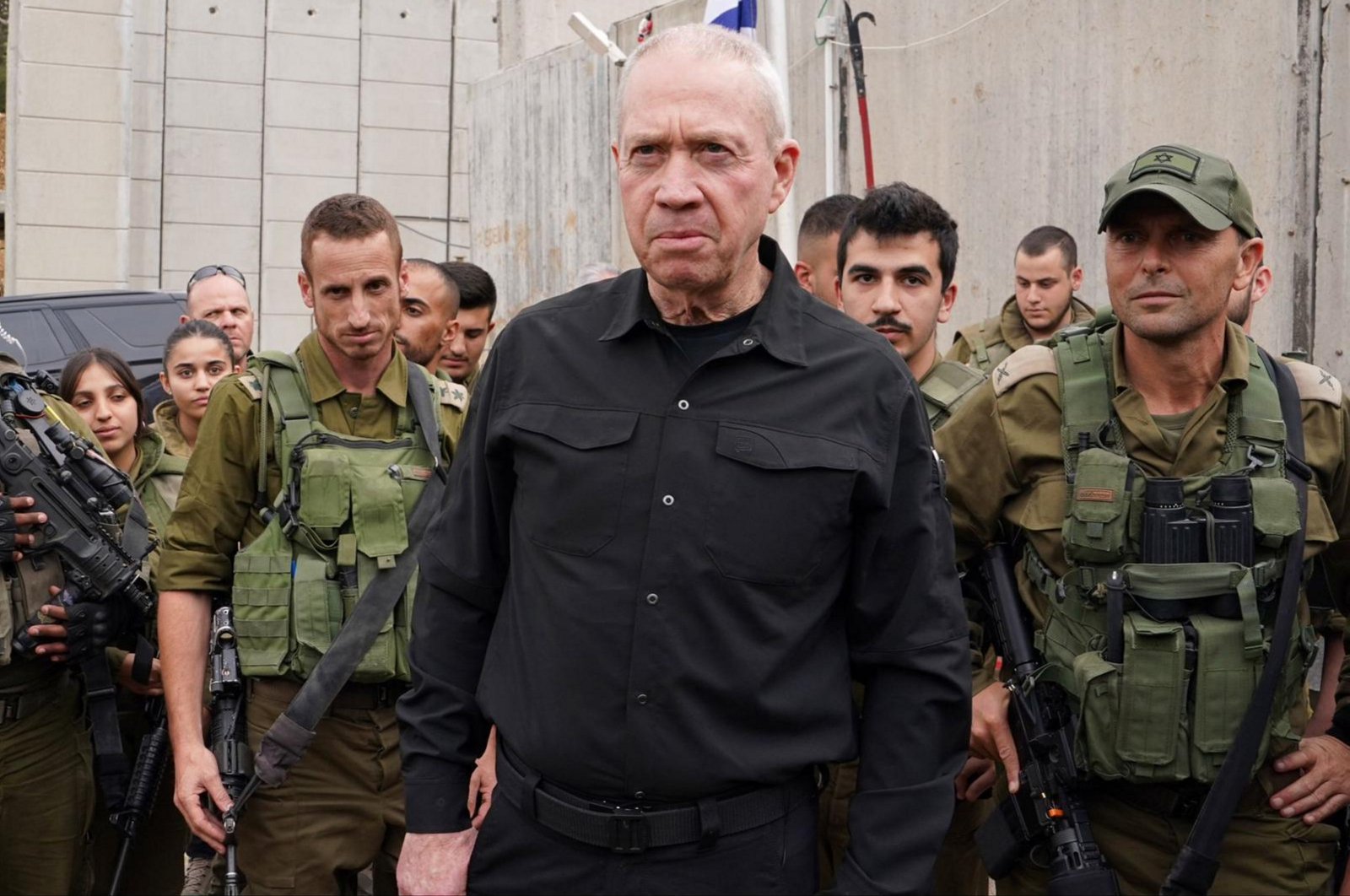 Israeli Defense Minister Yoav Gallant (C) among troops at an unidentified location in northern Israel, Nov. 11, 2023. (AA Photo)