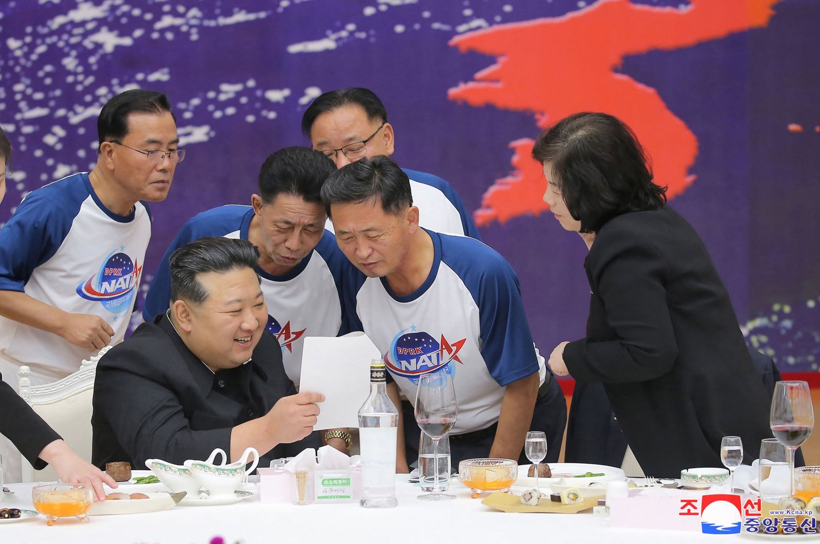 North Korea&#039;s leader Kim Jong Un (2nd L) chatting with senior officials of relevant departments at a banquet to celebrate the launch of a spy satellite, Pyongyang, North Korea, Nov. 23, 2023. (AFP Photo)