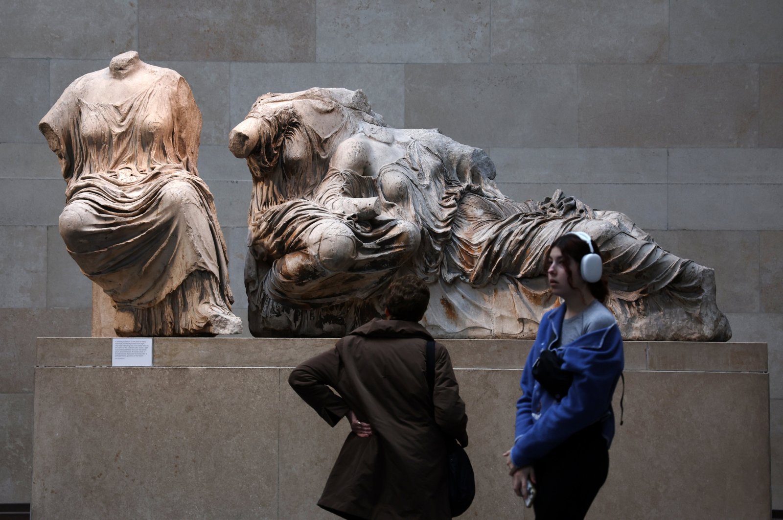 Visitors look at the Elgin marbles also known as the Parthenon marbles, at the British Museum in London, U.K., Nov. 28, 2023. (EPA Photo)