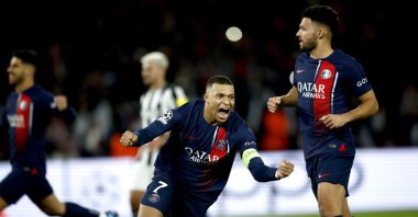 PSG's Kylian Mbappe (L) celebrates after scoring the 1-1 with a penalty during the UEFA Champions League Group F match against Newcastle United, Paris, France, Nov. 28, 2023. (EPA Photo)