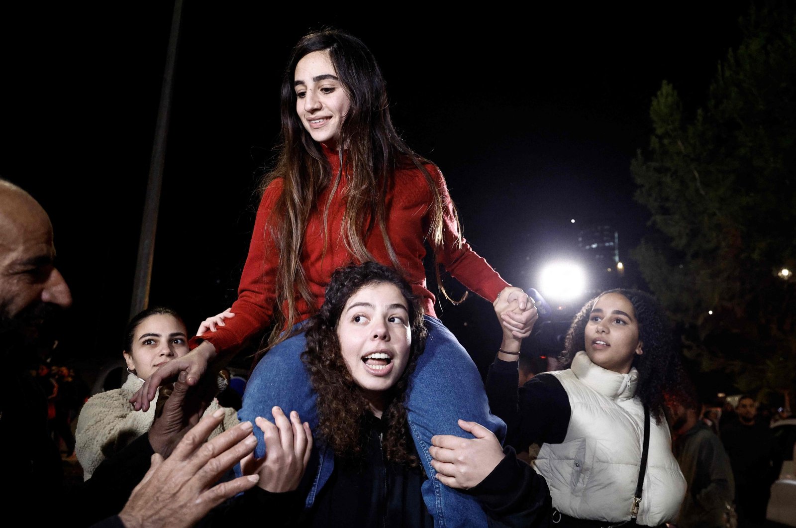 Newly released Palestinian prisoner Rouba Assi is carried by supporters during a welcome ceremony in Ramallah, occupied West Bank, Nov. 28, 2023. ()