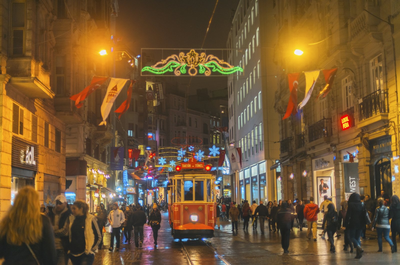 Illuminated tramway on a rainy Istiklal Avenue, Istanbul, Türkiye, Oct. 2, 2014. (Getty Images Photo)