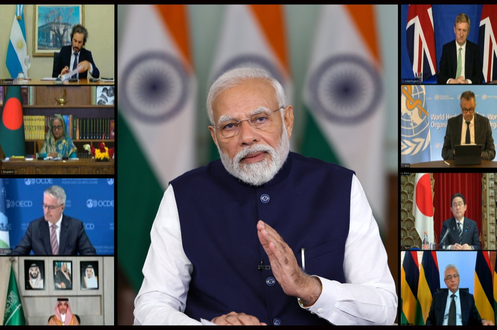 A handout photo made available by the Indian Press Information Bureau (PIB) shows Indian Prime Minister Narendra Modi (C) and other leaders on a screen during the G-20 virtual summit in New Delhi, India, Nov. 22, 2023. (EPA Photo)