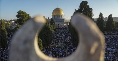 Muslim worshipers offer Eid al-Adha prayers next to the Dome of the Rock shrine at the Al-Aqsa Mosque compound in occupied East Jerusalem's Old City, Palestine, June 28, 2023. (AP Photo)