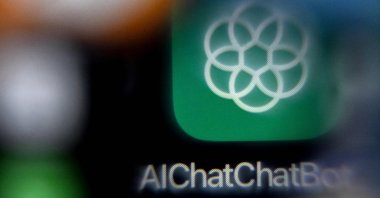 A photo taken shows the logo of the ChatGPT application developed by U.S. artificial intelligence research organization OpenAI on a smartphone screen in Frankfurt am Main, western Germany, Nov. 23, 2023. (AFP Photo)