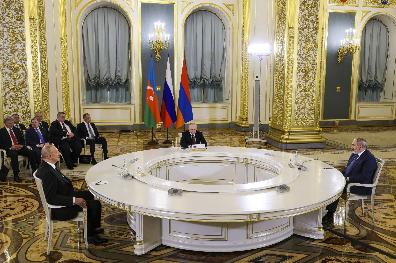 Russian President Vladimir Putin (C), Azerbaijani President Ilham Aliyev (L) and Armenian Prime Minister Nikol Pashinyan attend a trilateral meeting, Moscow, Russia, May 25, 2023. (AP Photo)