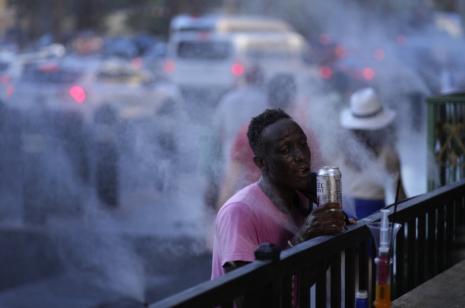 A man cools off in misters along the Las Vegas Strip, U.S., July 13, 2023. (AP Photo)
