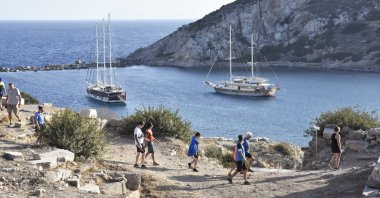 Tourists are seen walking at the Lycian Way, famous for hiking, Fethiye, southwestern Türkiye, Nov. 15, 2023. (AA Photo)
