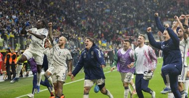 Italy players celebrate their qualifying after the Euro 2024 group C qualifying match between Ukraine and Italy at the BayArena, Leverkusen, Germany, Nov. 20, 2023. (AP Photo)