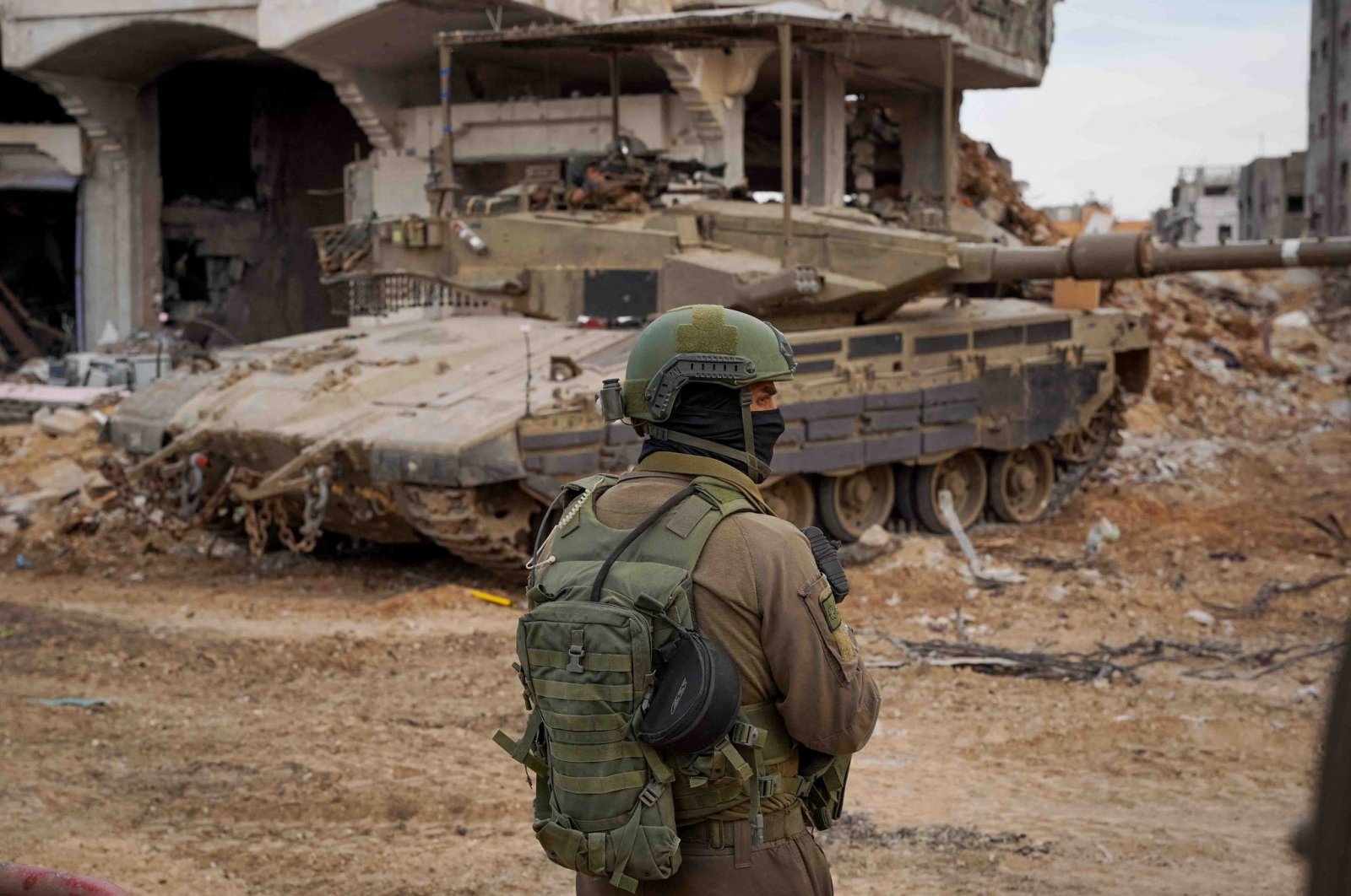 An Israeli soldier looks on as they operate in the Gaza Strip, Palestine, Dec. 1, 2023. (Reuters Photo)