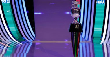 The trophy stands on the stage during the final draw for the UEFA Euro 2024 in Hamburg, Germany, Dec. 2, 2023. (AFP Photo)