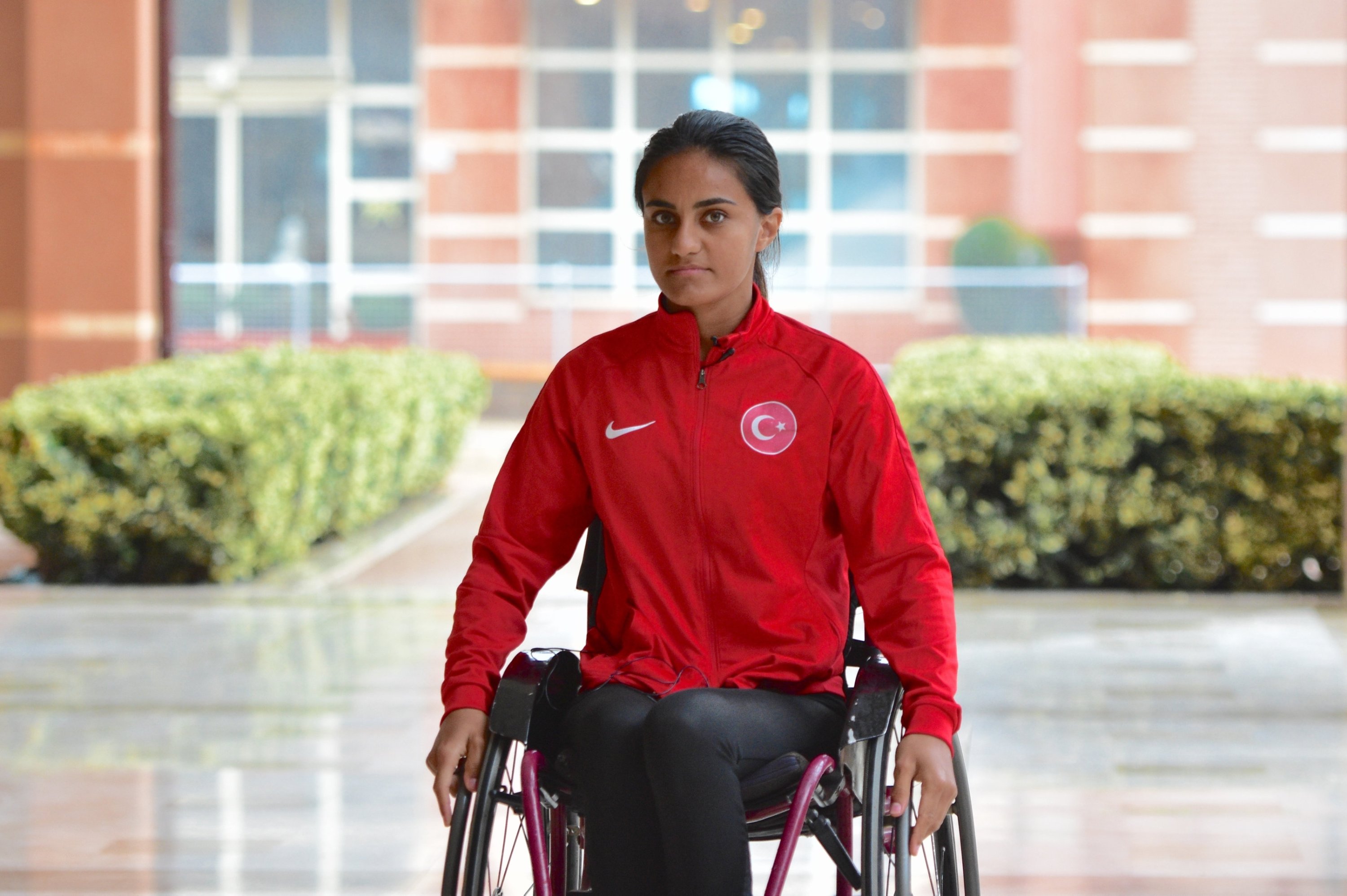 Turkish wheelchair tennis national team player Zeliha Aksak poses for a photo after an interview, Antalya, Türkiye, Nov. 29, 2023. (AA Photo)