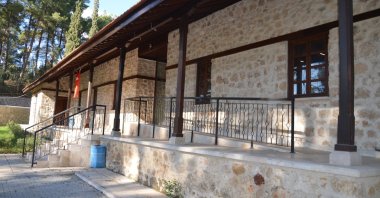 The exterior of a 90-Year-Old Stone School restored into a library, Antalya, Türkiye, Dec. 04, 2023. (DHA Photo)