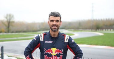 Turkish rider Kenan Sofuoğlu poses for a photo after an interview, Istanbul, Türkiye, Nov. 30, 2023. (AA Photo)