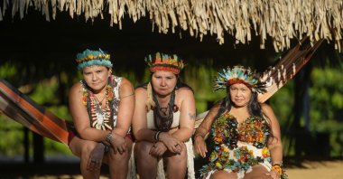 Juma Indigenous sisters Mandei Juma, from left, Mayta Juma and Borea Juma at their community, near Canutama, Amazonas state, Brazil, July 9, 2023. (AP Photo)