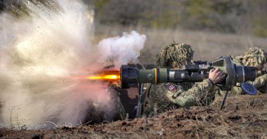 A Ukrainian serviceman fires an NLAW anti-tank weapon during an exercise in the Joint Forces Operation, in Donetsk region, Ukraine, Feb. 15, 2022. (AP Photo)