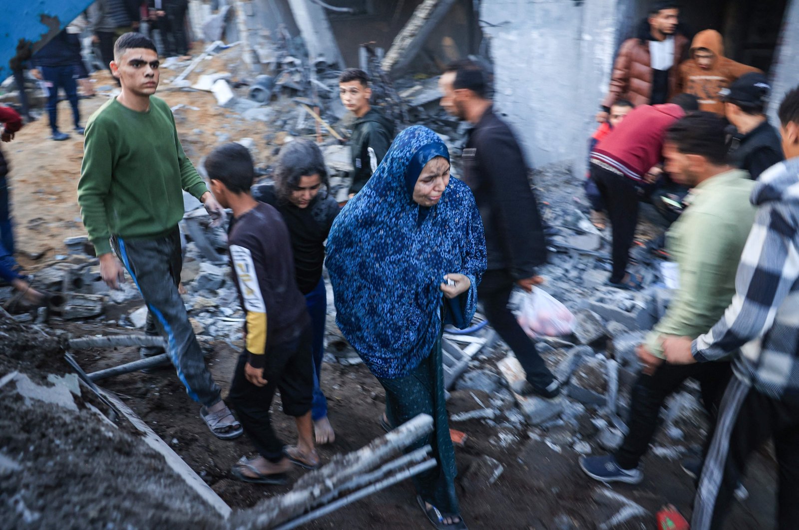Palestinians check the damages after an Israeli strike in Rafah, southern Gaza Strip, Palestine, Dec. 3, 2023. (AFP Photo)