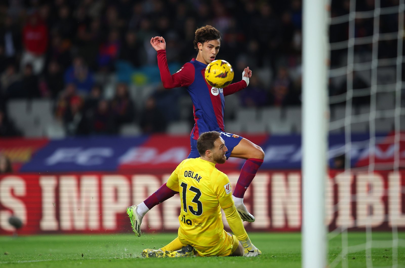 Barcelona&#039;s Joao Felix scores past Atletico Madrid&#039;s Jan Oblak during the La Liga match at Estadi Olimpic Lluis Companys, Barcelona, Spain, Dec. 3, 2023. (Getty Images Photo)