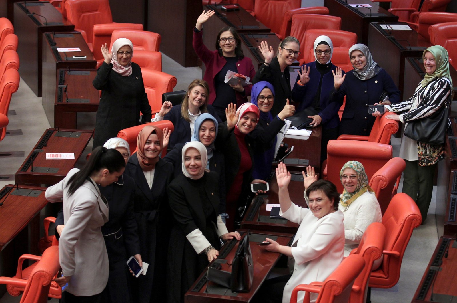Female members of Parliament from the Justice and Development Party (AK Party) pose after a debate at the assembly, in the capital Ankara, Türkiye, May 20, 2016. (Reuters Photo)
