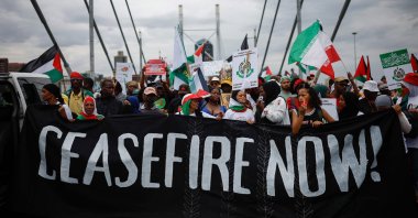 Demonstrators carry a banner during a pro-Palestinian demonstration by various political parties and trade unions in Johannesburg, South Africa, Nov. 29, 2023. (AFP Photo)