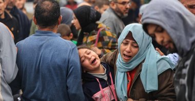 Palestinians mourn the death of loved ones following Israeli bombardment in southern Gaza, Palestine, Dec. 5, 2023. (AFP Photo)